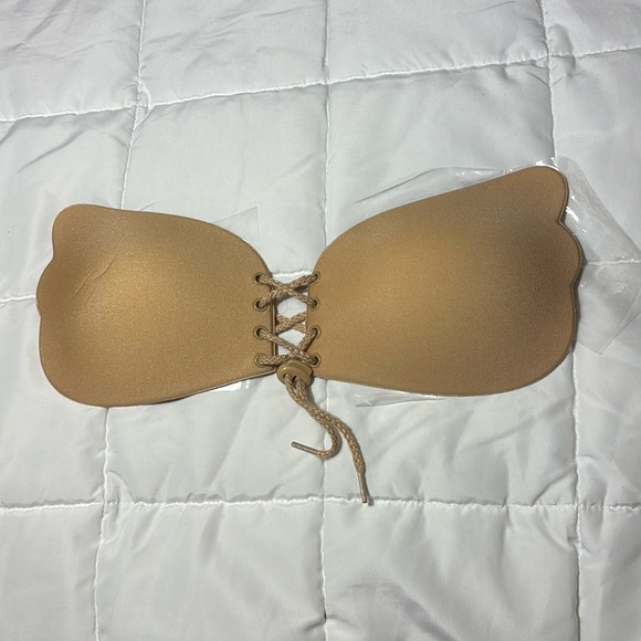 Cleavage Pal Backless and Strapless
Adhesive Lace Up Bra - Picture 2 of 9